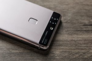 Shanghai, China - August 5, 2016: The Huawei P9 is an Android smartphone produced by Huawei. It was released in April 2016. It ihas a dual camera setup in the back co-engineered with Leica and with a fingerprint sensor.